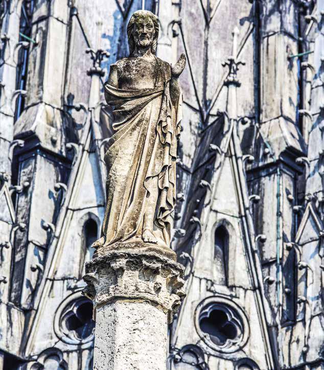 Worn statue. The passage of time and the Revolution took their toll on Notre-Dame.